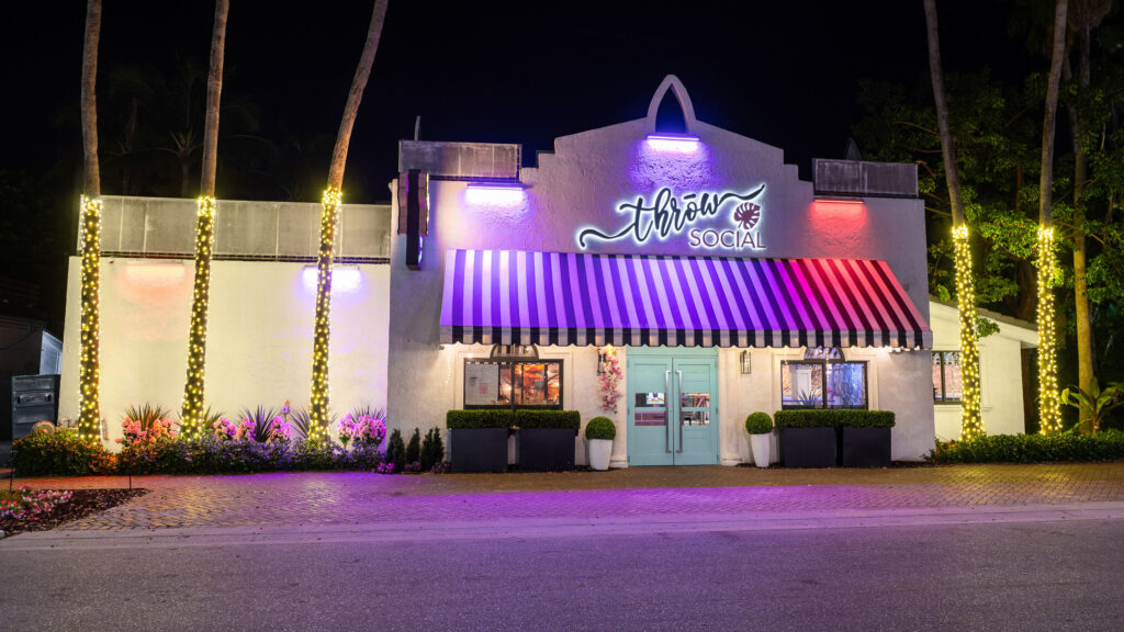 Throw Social Delray location is decorated in holiday lights. Used for restaurant lighting reference